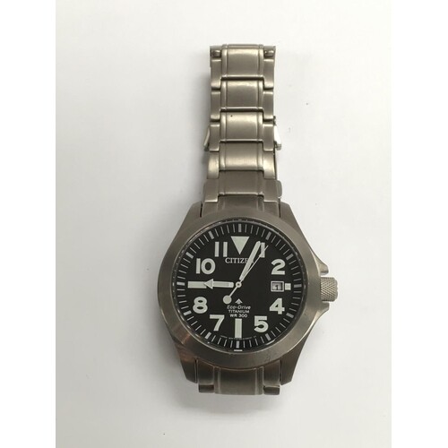 A Citizen eco pro master titanium watch with black face and ...
