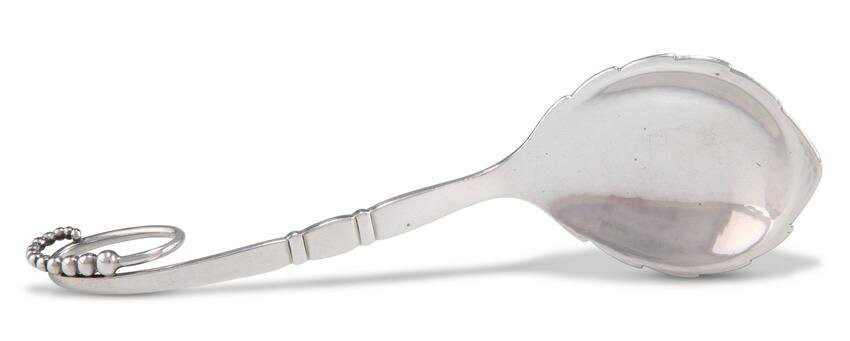 A DANISH STERLING SILVER PRESERVE SPOON, by Georg