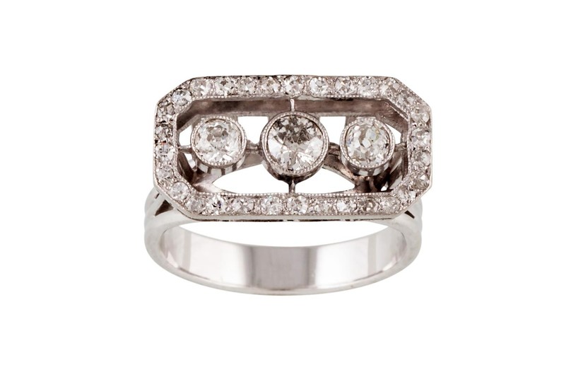 A DIAMOND CLUSTER RING, set with three old cut diamonds, col...