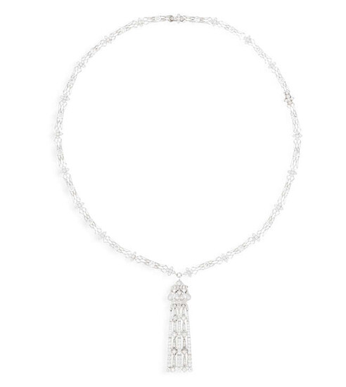 A DIAMOND LONG NECKLACE The articulated detachable tassel...