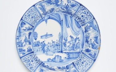 A Delftware dish with a rare Chinoiserie motif