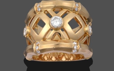 A Diamond Ring, by Cartier, two yellow bamboo link rows...