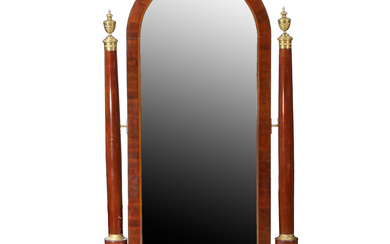 A FRENCH EMPIRE MAHOGANY AND ORMOLU MOUNTED CHEVAL MIRROR.