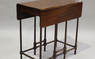 A George III mahogany drop-flap spider-legged occasional table, the rectangular top on turned and bl