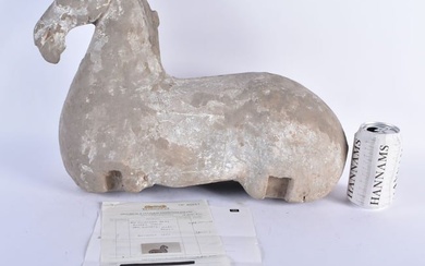 A LARGE CHINESE HAN DYNASTY GREY POTTERY FIGURE OF A HORSE C202 BC - 220 AD. 42 cm x 34 cm.