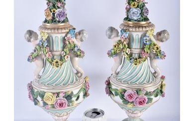 A LARGE PAIR OF 19TH CENTURY GERMAN PORCELAIN TWIN HANDLED V...