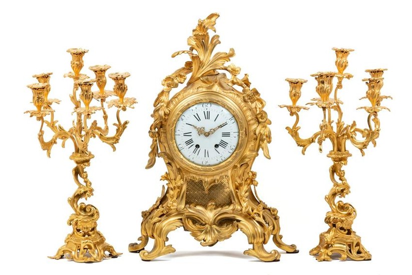 A Louis XV Style Gilt Bronze Three-Piece Clock