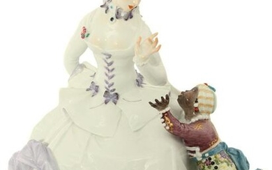 A MEISSEN PORCELAIN GROUPING OF A WOMAN WITH MAURO BOY
