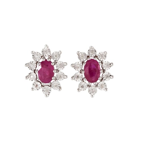 A PAIR OF DIAMOND AND RUBY CLUSTER EARRINGS, mounted in whit...