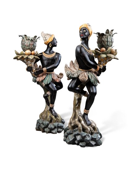 A PAIR OF EBONISED, PARCEL-GILT AND POLYCHROME-PAINTED FIGURAL TORCHERES, SUPPLIED BY MANN & FLEMING, MID-20TH CENTURY