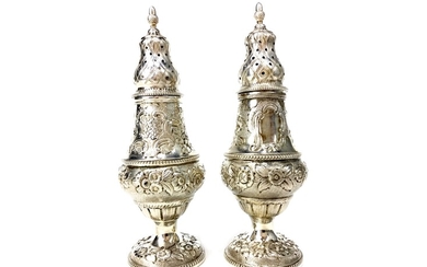 A PAIR OF EDWARDIAN SILVER SUGAR CASTERS