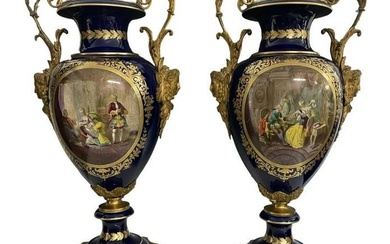 A PALATIAL PAIR OF ORMOLU MOUNTED SEVRES PORCELAIN VASES