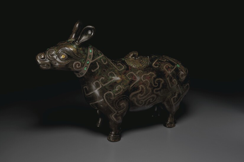 A RARE LARGE GOLD AND SILVER-INLAID BRONZE TAPIR-FORM VESSEL, XIZUN, YUAN-MING DYNASTY (1279-1644)