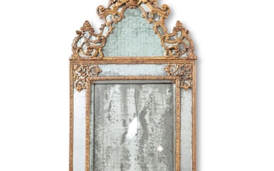 A Régence carved giltwood mirror | Miroir à fronton en bois sculpté et doré, d'époque Régence