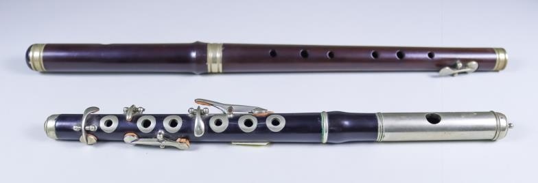 A Rosewood Single Key Flute, 15.25ins, and an ebony...