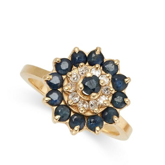 A SAPPHIRE AND DIAMOND DRESS RING set with a round cut