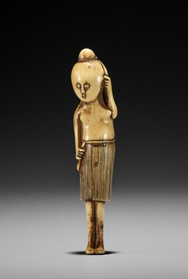 A STAG ANTLER NETSUKE OF A DIVING GIRL (AMA)