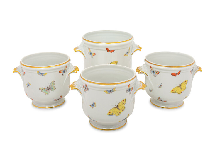 A Set of Four Limoges Porcelain Cache Pots