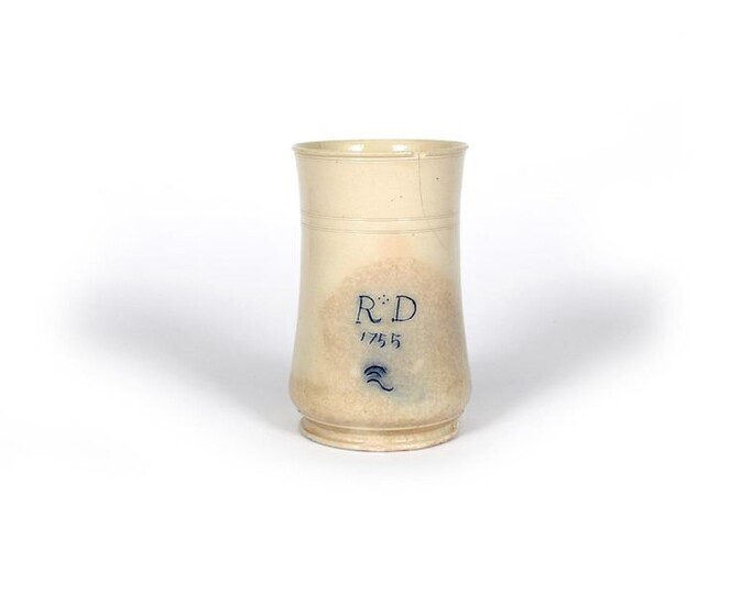 A Staffordshire salt-glazed Scratch Blue mug dated 1755,...