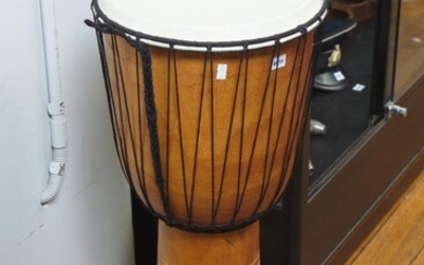 A TRIBAL WOODEN DRUM