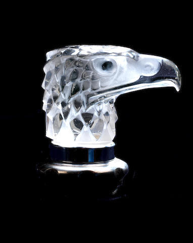 A 'Tete d'Aigle' glass mascot by Rene Lalique, French, introduced 14th March 1928