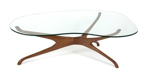 A Trisymmetric Walnut and Glass Coffee Table