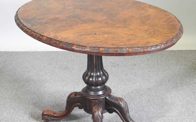 A Victorian burr walnut occasional table, with a hinged oval...