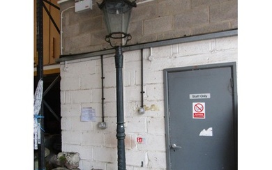 A Victorian style cast iron lamp post with hexagonal tapere...