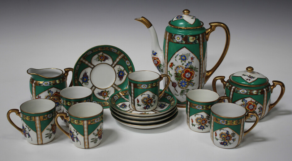 A 'Vienna' style porcelain part cabaret set, early 20th century, decorated with classical