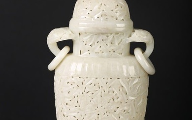 A WHITE JADE MUGHAL STYLE RETICULATED VASE