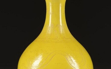 A YELLOW-GLAZED PEAR-SHAPED CARVED 'DRAGON' VASE