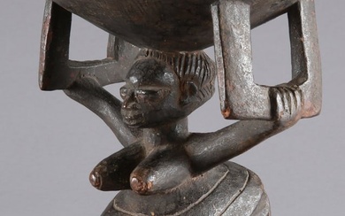 A Yoruba Bowl bearing Figure, "agere ifa"