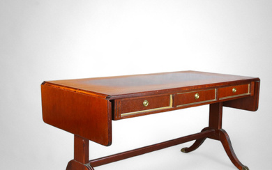 A coffee table with flaps and drawers, English style, mahogany, brass details, 20th century.