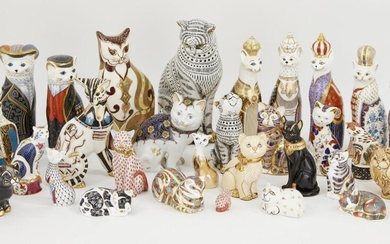 A collection of Royal Crown Derby porcelain cat paperweights, to include; six with gold stoppers, 13cm high, a further eight crown Derby cats without stoppers from 'The Royal Cats' series to include; 'Pearly King', 19cm high, 'Pearly Queen', 20cm...
