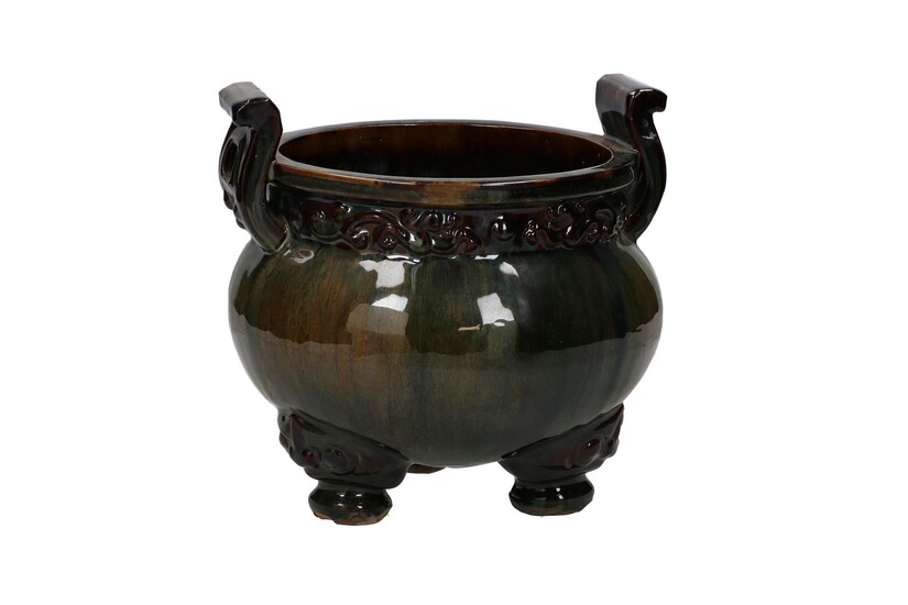 (-), A flambé glazed earthenware tripod censer. China,...