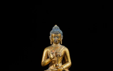 A gilt-copper alloy figure of Medicine Buddha, Tibet, 17th century