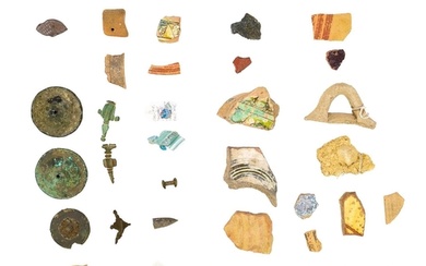 A group of Cypriot pottery shards and glass fragments. Toget...