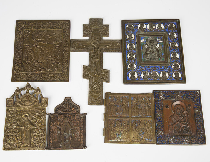 A group of mainly 19th century Russian cast brass icons, including a rectangular enamelled example