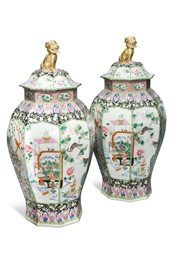 A large pair of Chinese porcelain famille rose octagonal vases and covers