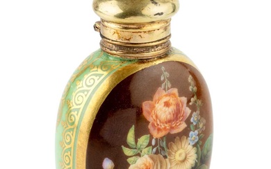 A late 19th century French porcelain scent bottle, of ovoid...