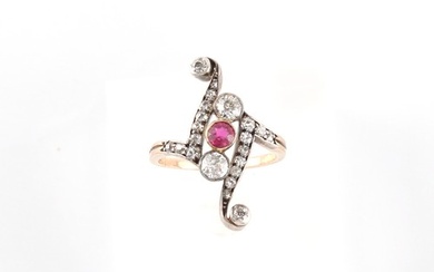 A late 19th / early 20th century ruby & diamond scroll form ...