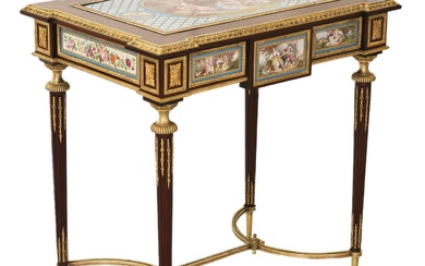 A magnificent ladies table with gilded bronze decor and porcelain...