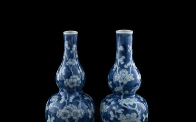 A near pair of Chinese blue and white 'plum blossom' hulu vases, late 19th century