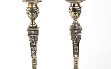 A pair of English sterling silver candlesticks - London...