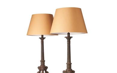 A pair of French cast iron lamp bases in Louis Philippe taste