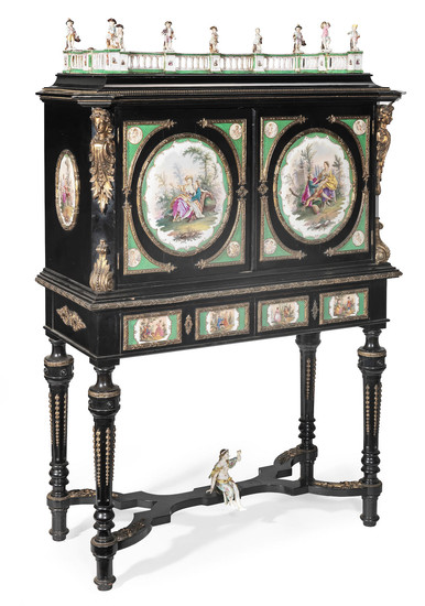 A pair of German 19th century porcelain and gilt bronze mounted ebonised cabinets on stands