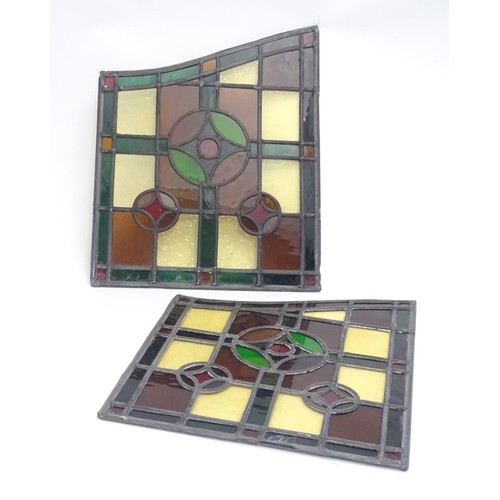 A pair of early 20thC lead and stained glass window / door p...