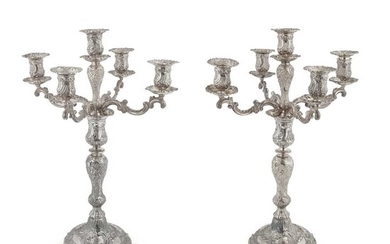 A pair of late Victorian four branch candelabra