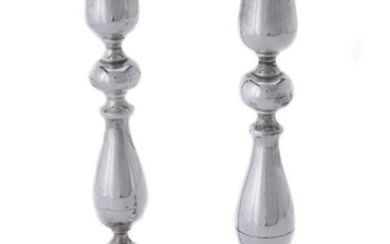A pair of silver circular candlesticks by Joseph Gloster Ltd