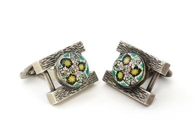A pair of silver cufflinks with millefiori domed cabochon de...